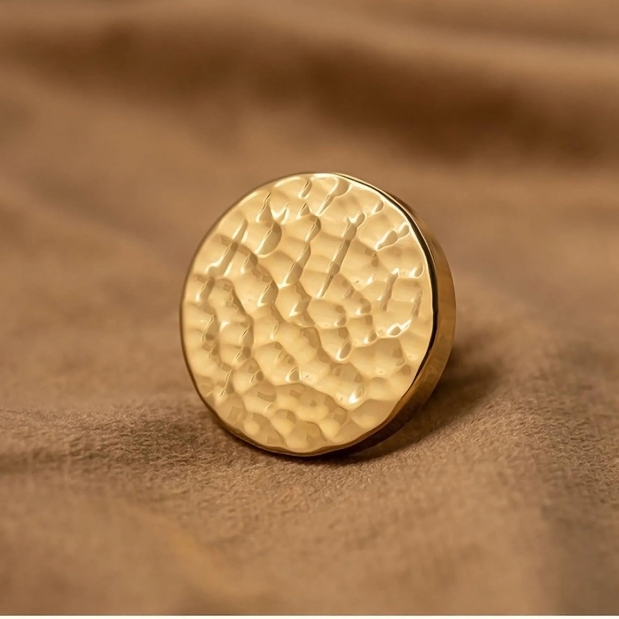 The Radiant Bloom Knob by Mantara B-0109 is a brushed brass round knob in gold, ideal for drawers, cabinets, and kitchens.