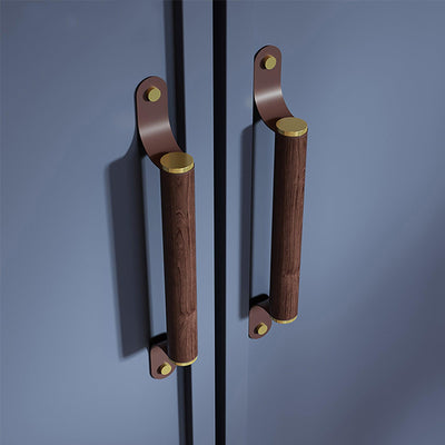 Ranch Handle W-0006 features a brushed brass, leather, and wood combination in a modern design—available in 120mm sizes, ideal for wardrobes, main doors, and furniture by Mantara.