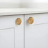 The Mantara B-0028 Rasya Knob is a modern gold brass knob with brushed finish, ideal for doors, drawers, cabinets, and wardrobes