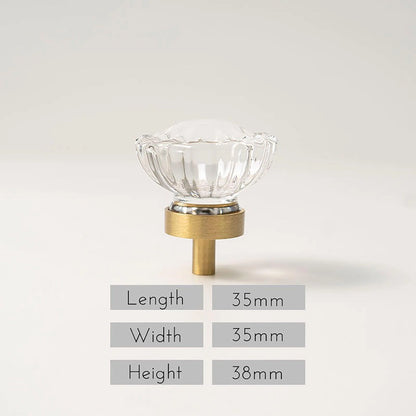 The Mantara C-0018 Ripple Knob is a modern crystal and brass knob in white finishes, ideal for kitchens and cabinets.