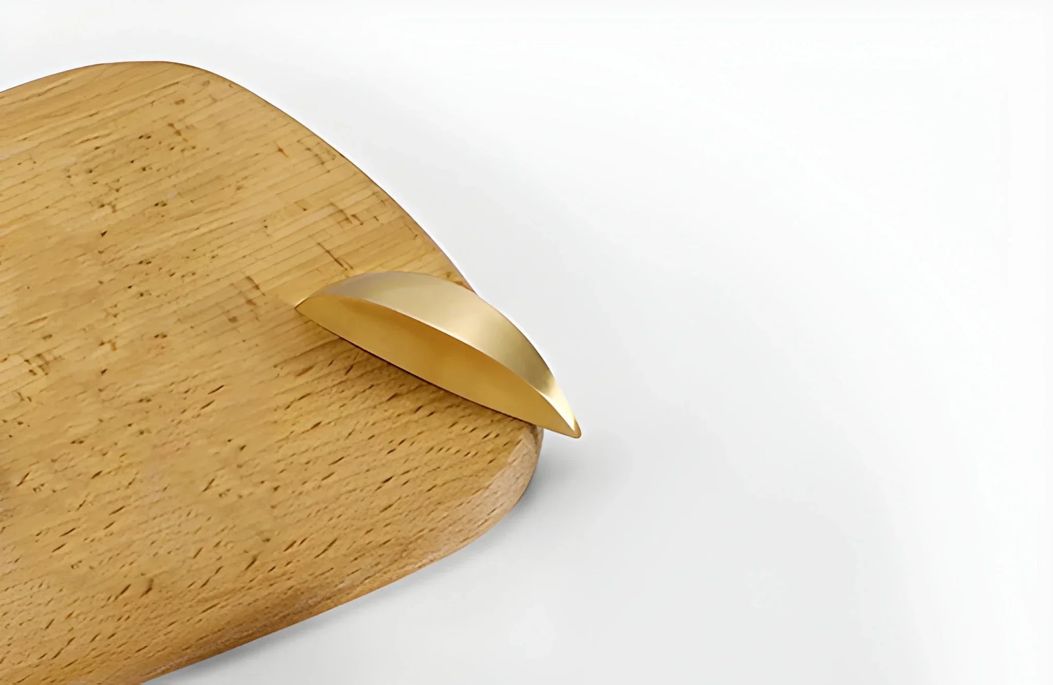 The Mantara B-0024 Selene Pull Handle is a modern brushed brass handle in gold, ideal for drawers, cupboards, and bedrooms.