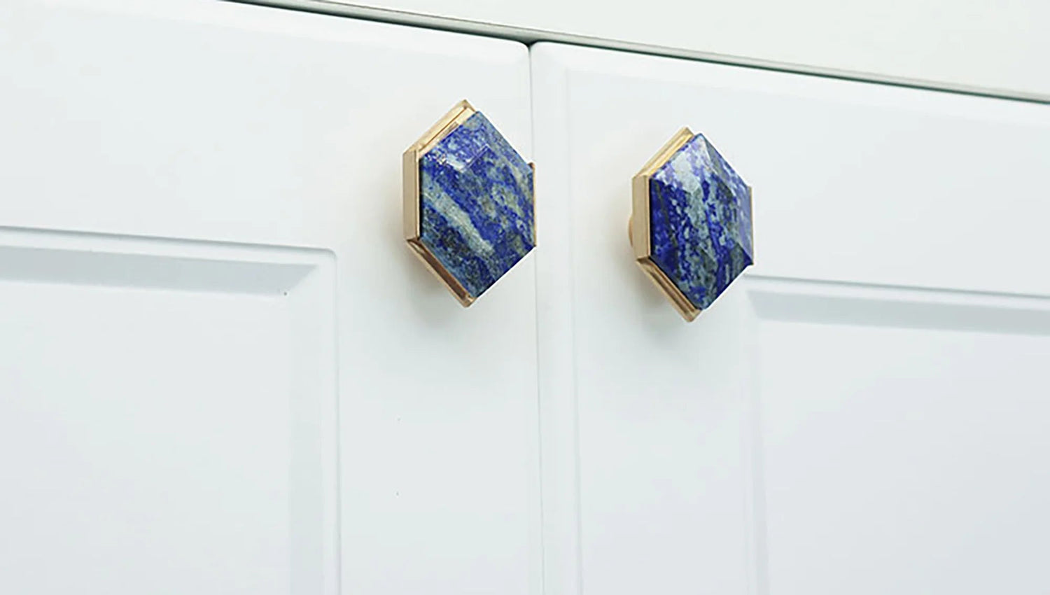The Mantara C-0004 is a Nordic crystal + brass knob in blue, ideal for wardrobes, drawers &amp; cabinets.