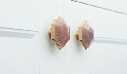 The Mantara C-0004 is a Nordic crystal + brass knob in pink, ideal for wardrobes, drawers &amp; cabinets.