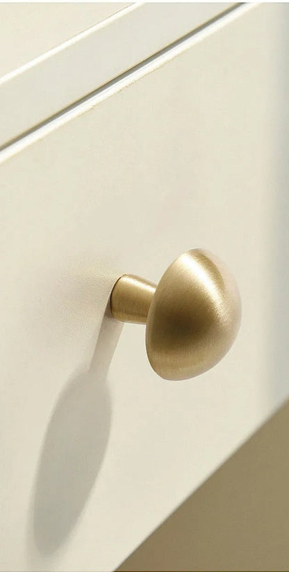 Mantara Shroom Knob B-0100 is a modern solid brass knob in brushed gold, perfect for kitchens, cabinets, and furniture.