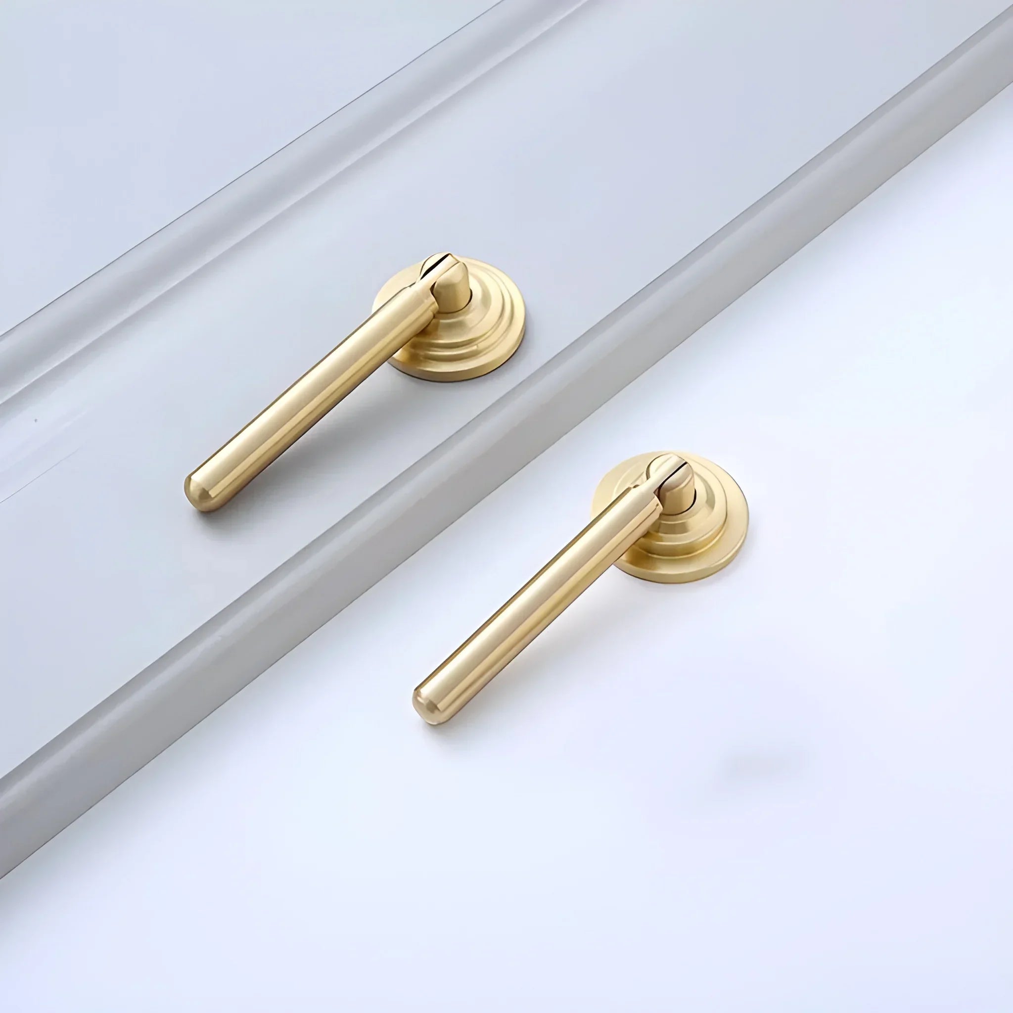 The Mantara B-0037 Simplicity Drop Knob is a modern brushed brass knob in gold, ideal for wardrobes, main doors, furniture, and cabinets.