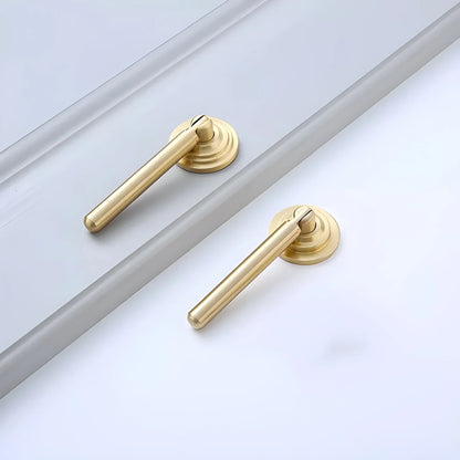 The Mantara B-0037 Simplicity Drop Knob is a modern brushed brass knob in gold, ideal for wardrobes, main doors, furniture, and cabinets.