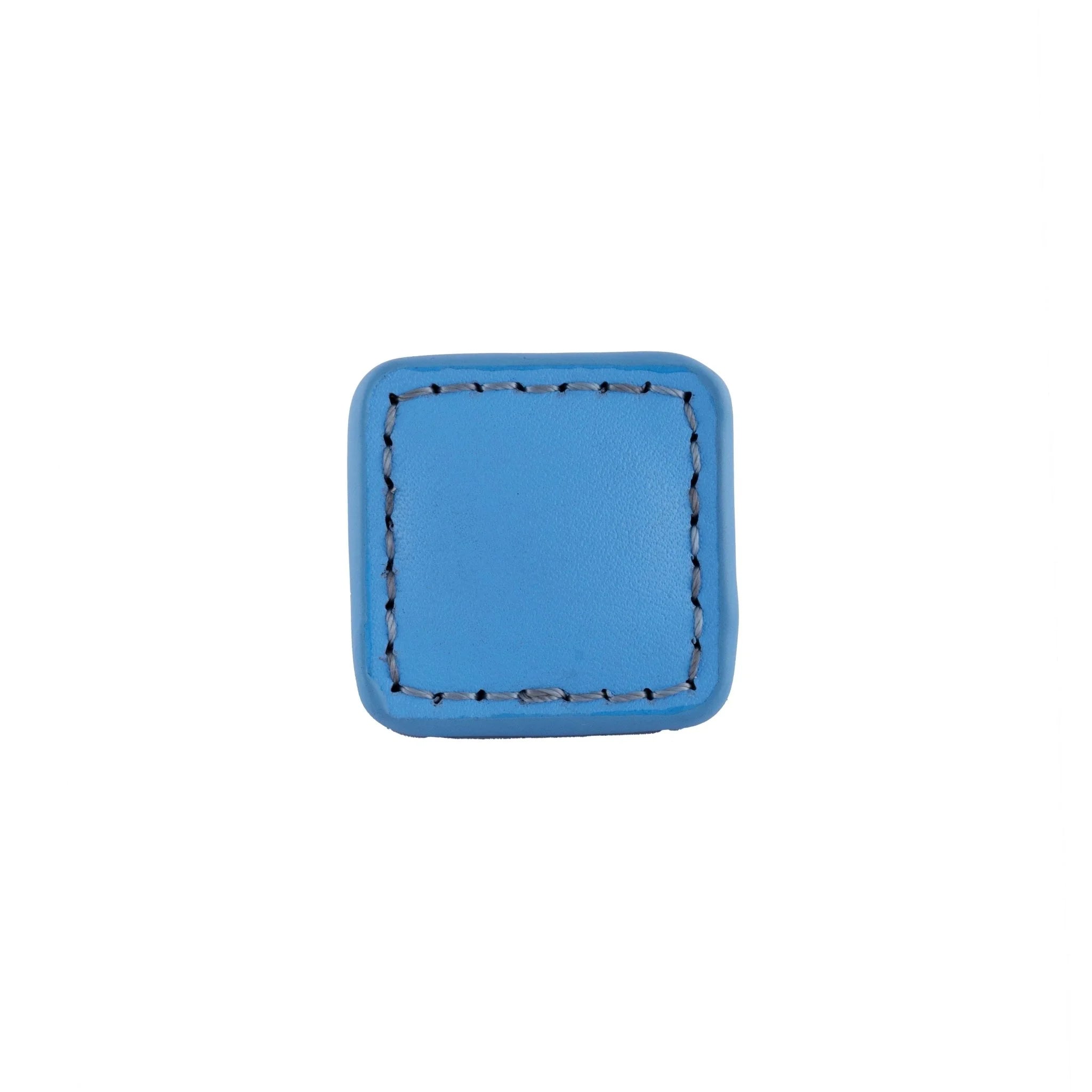The Mantara L-0008 Sofia Square Knob is a modern leather knob in blue, perfect for cabinets and drawers.