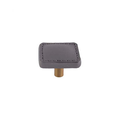 The Mantara L-0008 Sofia Square Knob is a modern leather knob in grey, perfect for cabinets and drawers.