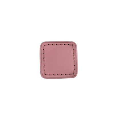 The Mantara L-0008 Sofia Square Knob is a modern leather knob in pink, perfect for cabinets and drawers.