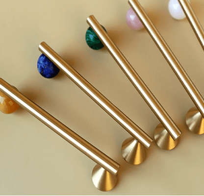 The Mantara C-0022 Solstice Handle is a modern crystal and brass handle in green and white, ideal for wardrobes, drawers, and cabinets.