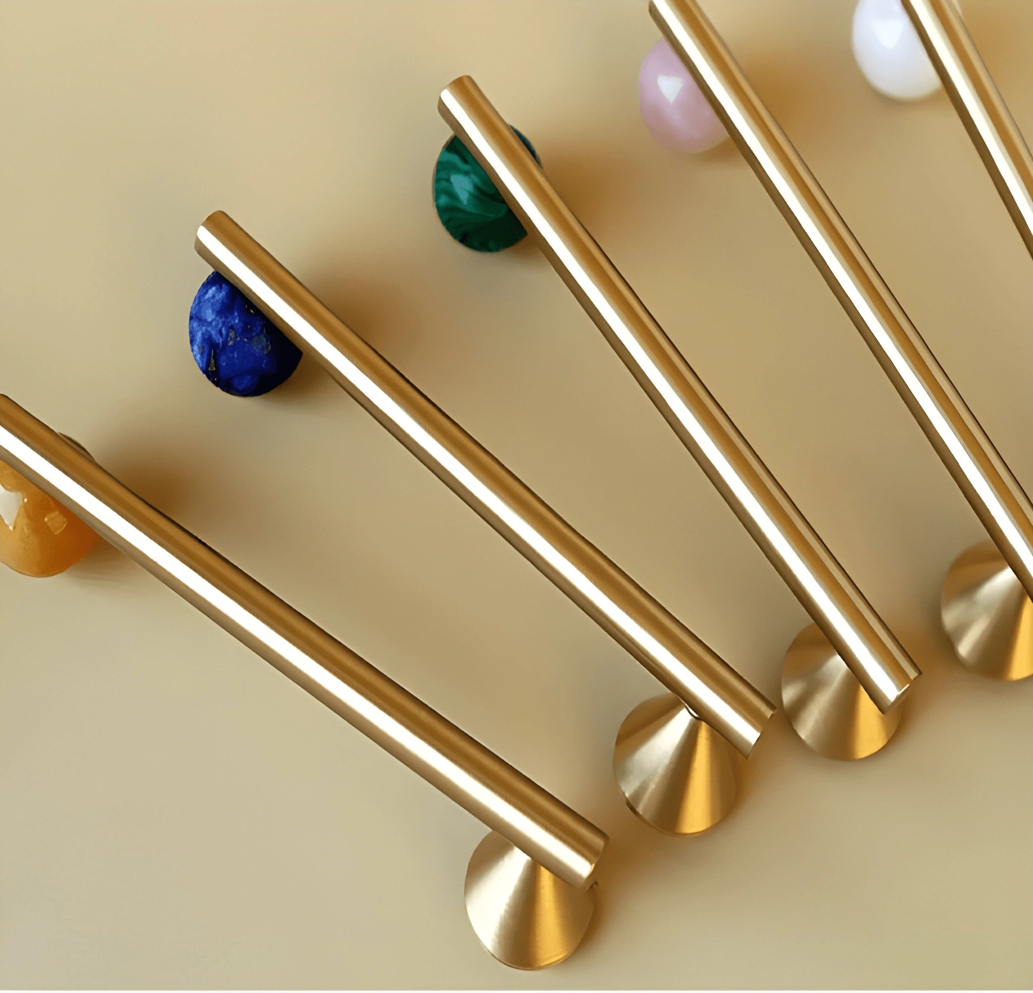 The Mantara C-0022 Solstice Handle is a modern crystal and brass handle in green , ideal for wardrobes, drawers, and cabinets.
