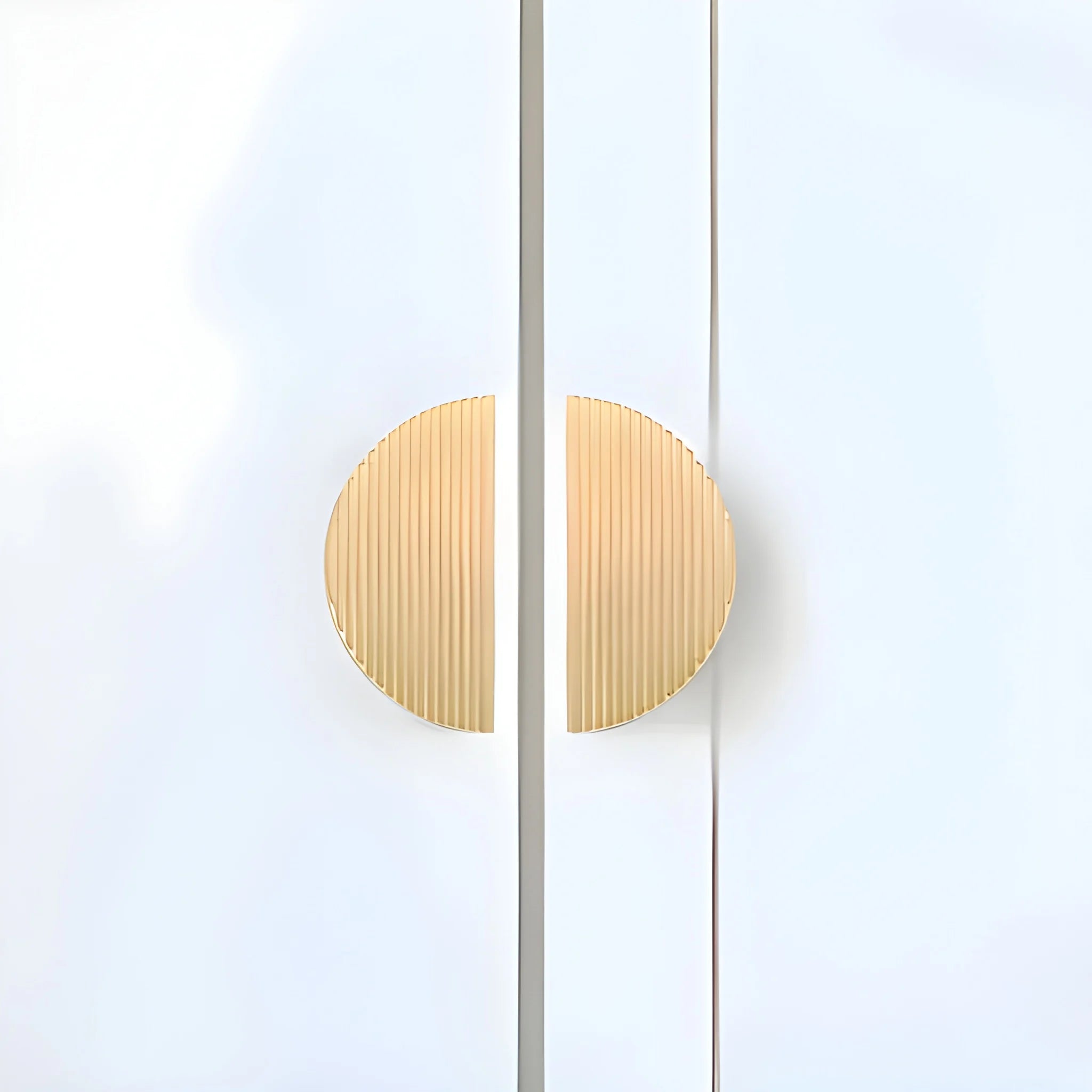 The Sorelle Handle by Mantara B-0113 is a modern brushed brass knob in gold, perfect for kitchen drawers and cabinets.