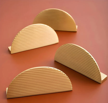 The Sorelle Handle by Mantara B-0113 is a modern brushed brass knob in gold, perfect for kitchen drawers and cabinets.