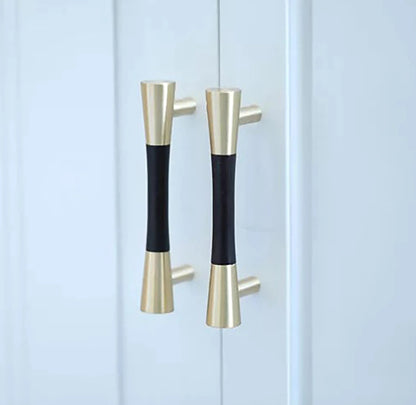 Furniture handle in brass and wood, featuring a tapered form in black and gold finish, Sylvia Handle W-0014 by Mantara.