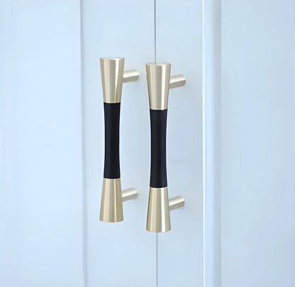 Mantara Sylvia Handle W-0014 is a modern brass &amp; wood handle in black+gold,ideal for wardrobes &amp; drawers.