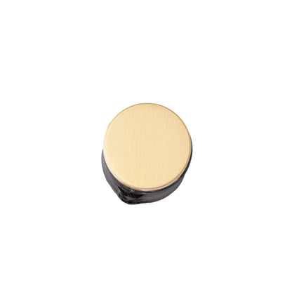 The Mantara L-0003 Tanner Knob is a modern brass and leather knob in black, perfect for cabinets and furniture.