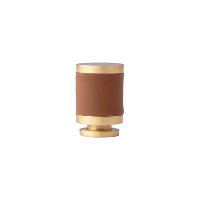 The Mantara L-0003 Tanner Knob is a modern brass and leather knob in brown, perfect for cabinets and furniture.