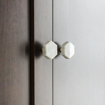 The Mantara M-0002 Tetris Knob is a modern marble and brass knob in white, perfect for doors, drawers, and cabinets.