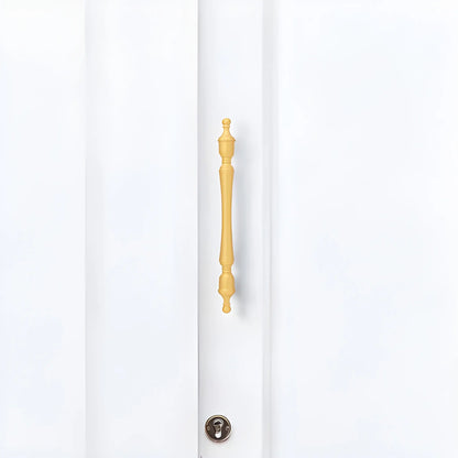 The Mantara B-0129 Thara Handle is a modern brass handle in bronze and gold, ideal for drawers, cabinets, and kitchen furniture.