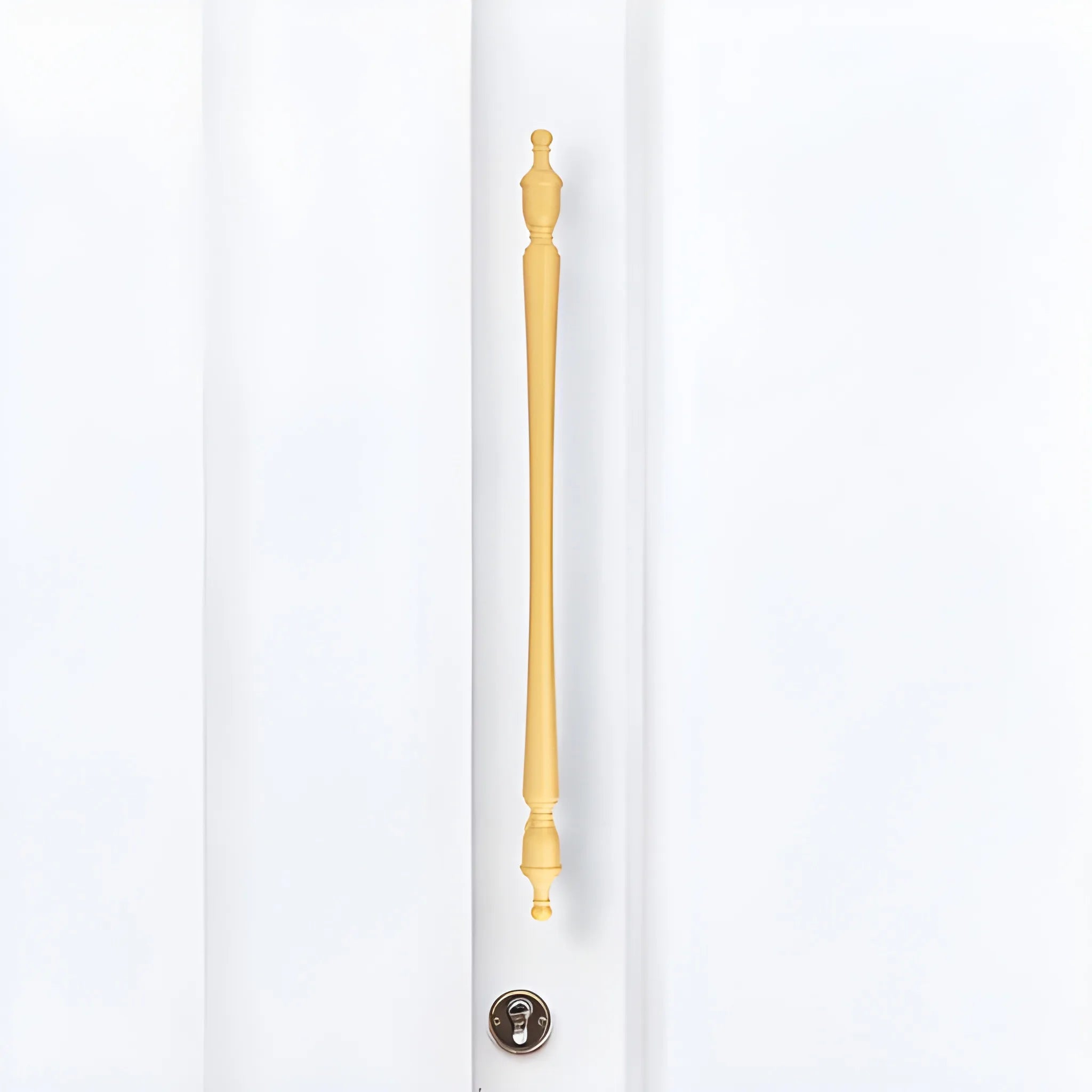 The Mantara B-0129 Thara Handle is a modern brass handle in bronze and gold, ideal for drawers, cabinets, and kitchen furniture.