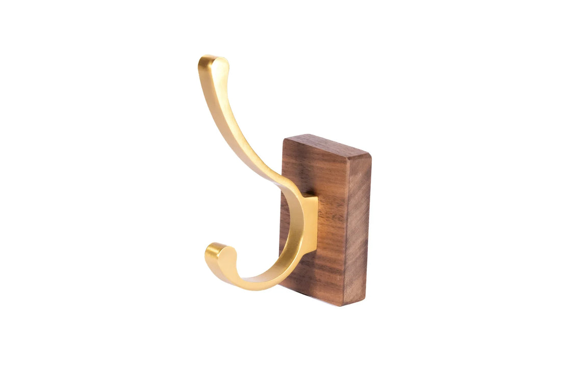 Mantara Thorne Hook W-0032 is a modern space aluminum and walnut hook in gold and  ideal for kitchen and dresser drawers.