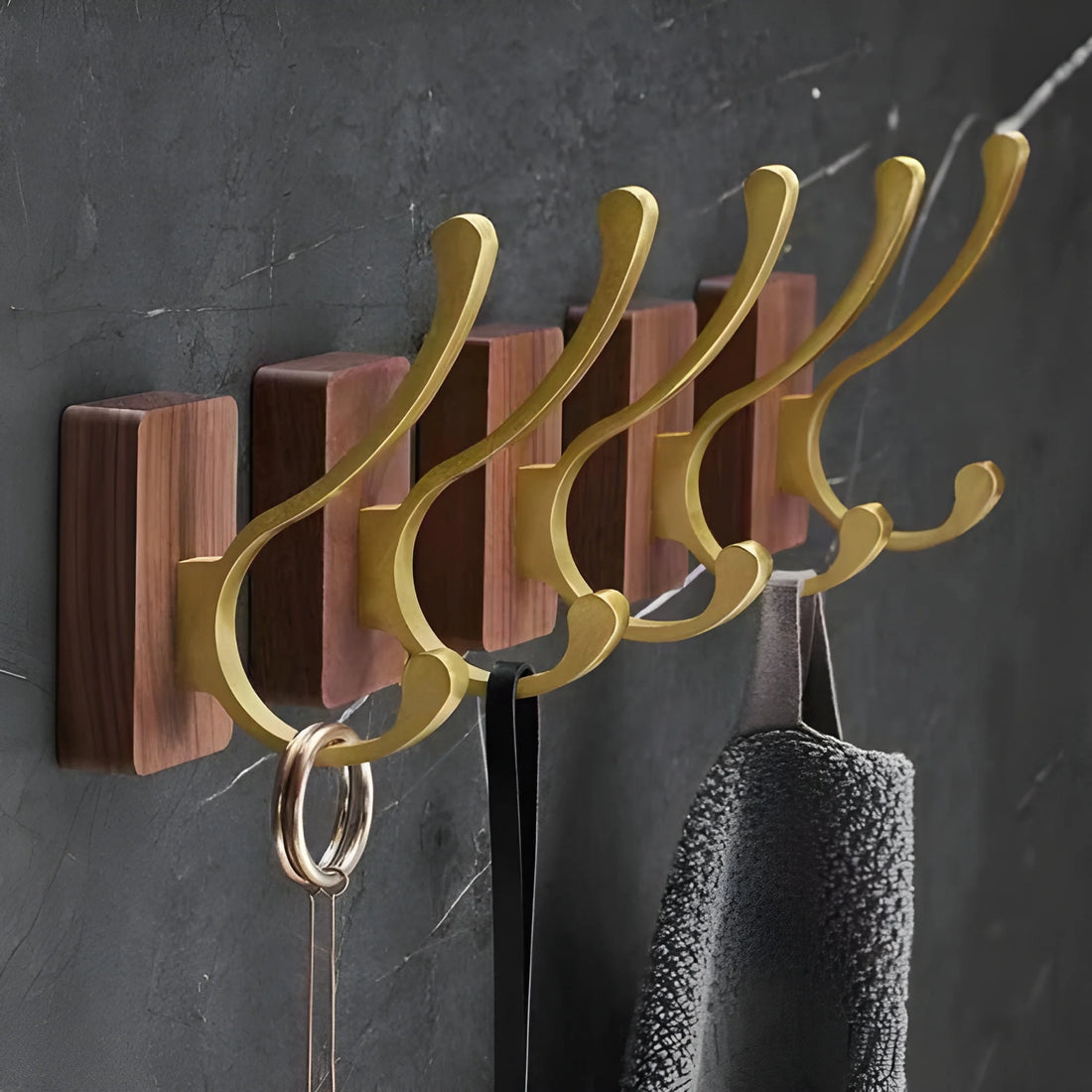 Mantara Thorne Hook W-0032 is a modern space aluminum and walnut hook in gold and  ideal for kitchen and dresser drawers.