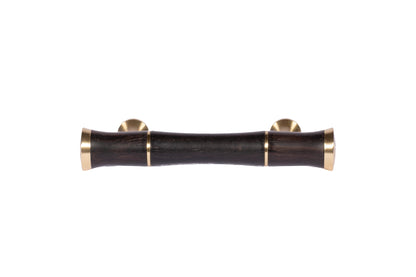 Mantara Titus Handle  W-0019 is a modern brass and wood handle in black  brushed finish, ideal for kitchen drawers and dresser drawers.