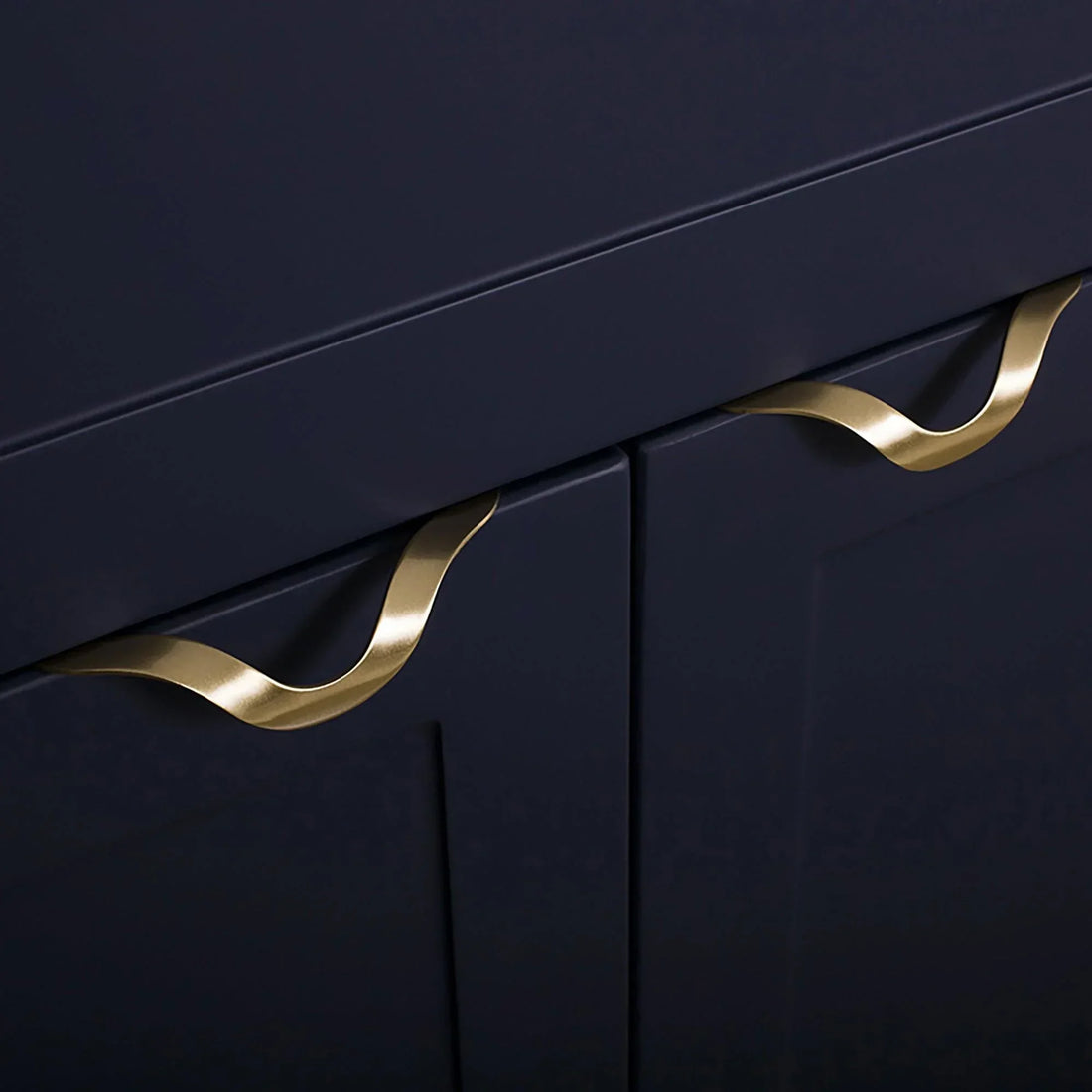 The Mantara B-0048 Trinity Pull Knob is a modern brushed brass knob in gold, perfect for drawers, furniture, bedrooms, and kitchens.