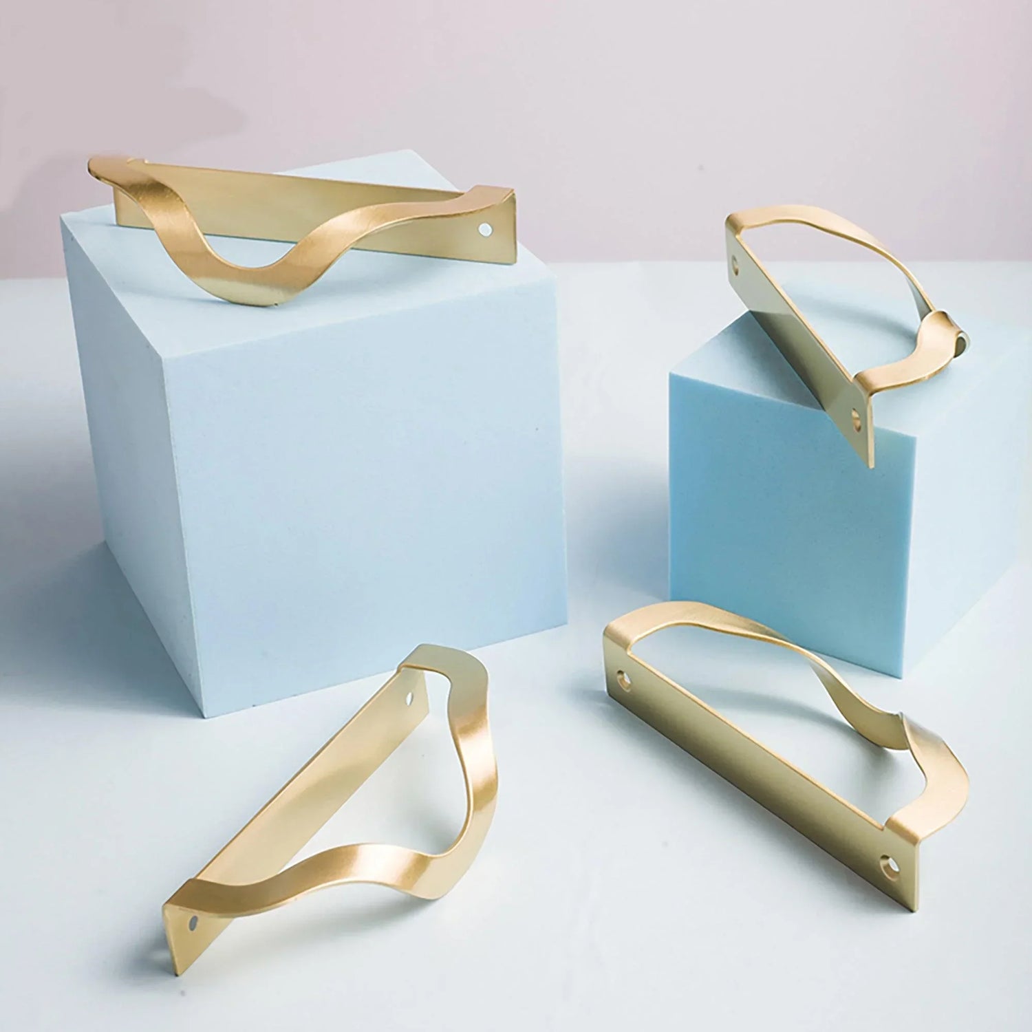 The Mantara B-0048 Trinity Pull Knob is a modern brushed brass knob in gold, perfect for drawers, furniture, bedrooms, and kitchens.
