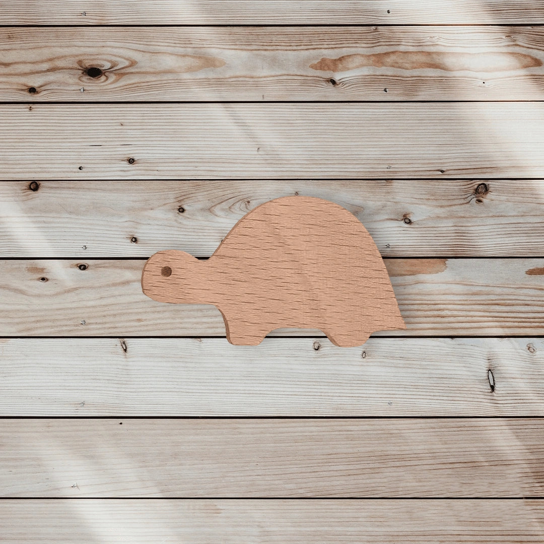Mantara Turtle Knob  W-0024 is a modern  beige wooden knob/hook, ideal for kids’ rooms, drawers, and wardrobes.
