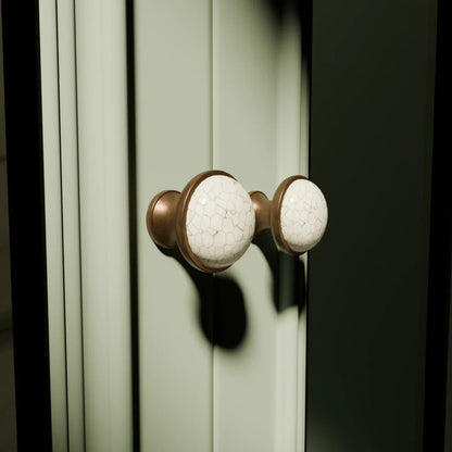 The Mantara CR-0007 Empire Knob is a traditional zinc and ceramic handle in white with a polished finish, ideal for wardrobes and cabinets.