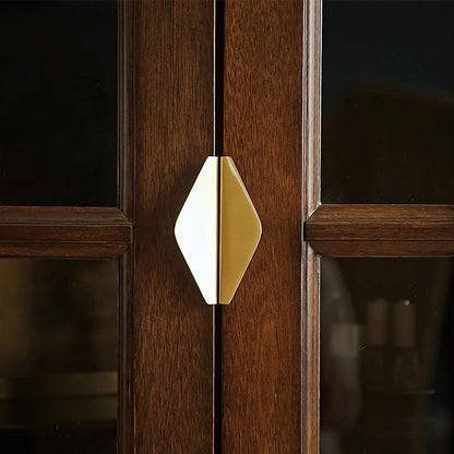 B-0049 round brass knob with cross-cut texture. Modern cabinet hardware for wardrobes, kitchens, and drawers by MANTARA