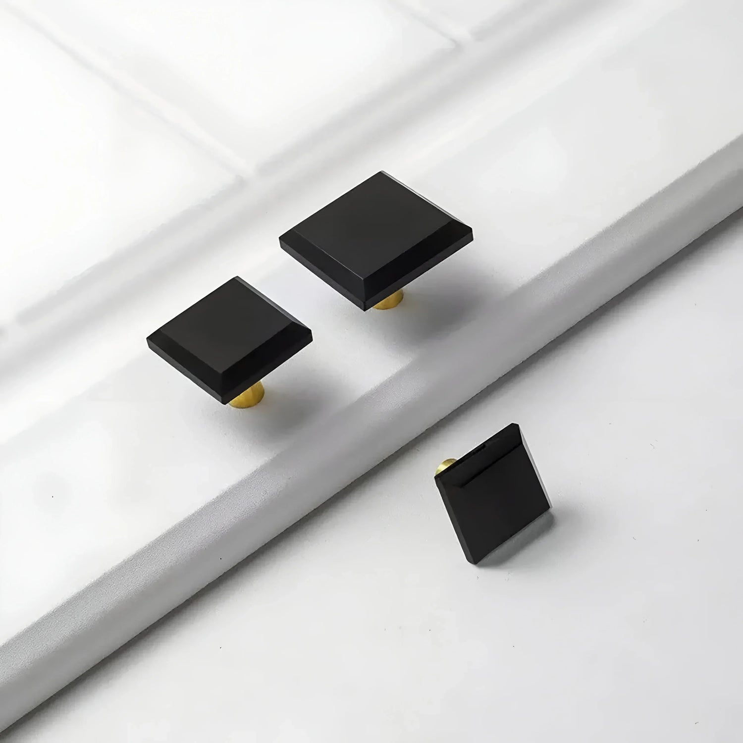 The Mantara A-0013 Void Knob is a modern black brass and acrylic knob with polished finish, perfect for doors, drawers, and cabinets.