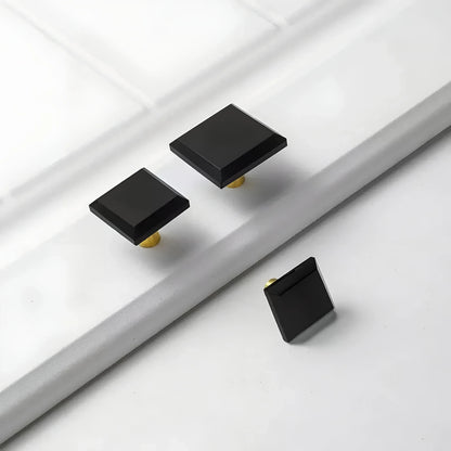 The Mantara A-0013 Void Knob is a modern black brass and acrylic knob with polished finish, perfect for doors, drawers, and cabinets.