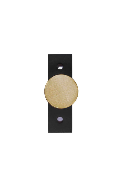 The Mantara B-0118 is a modern brass knob in gold with a black stabiliser base, ideal for kitchen and dresser drawers.