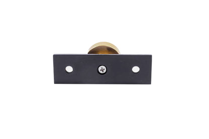 The Mantara B-0118 is a modern brass knob in gold with a black stabiliser base, ideal for kitchen and dresser drawers.