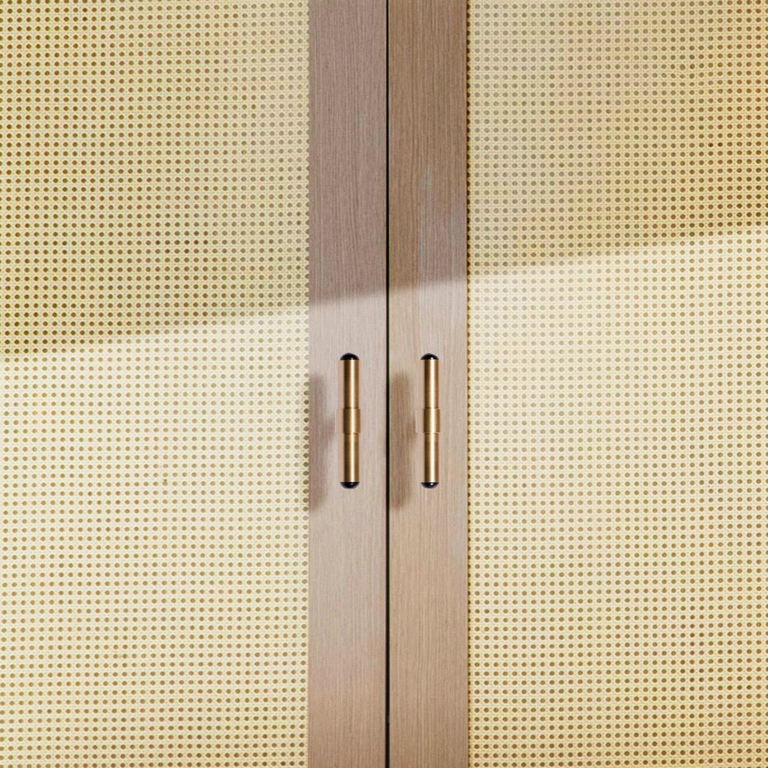The Zania Handle by Mantara B-0111 is a modern brushed brass handle in gold, ideal for kitchens, dressers, and cabinets.