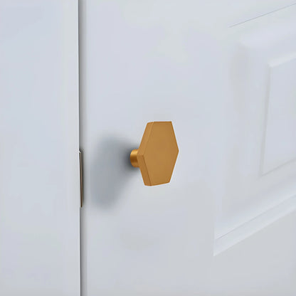 The Mantara B-0131 Zaraya Knob is a modern brass knob in gold, black, and bronze, perfect for drawers, cabinets, and wardrobes.