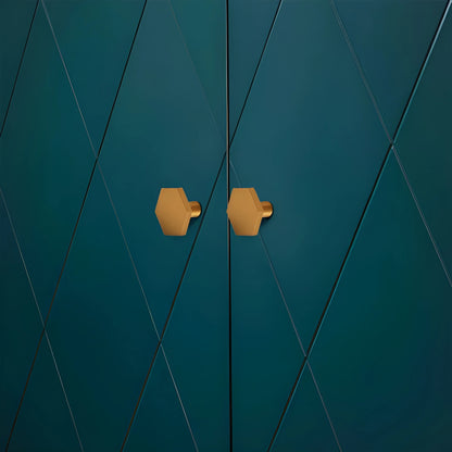 The Mantara B-0131 Zaraya Knob is a modern brass knob in gold, black, and bronze, perfect for drawers, cabinets, and wardrobes.