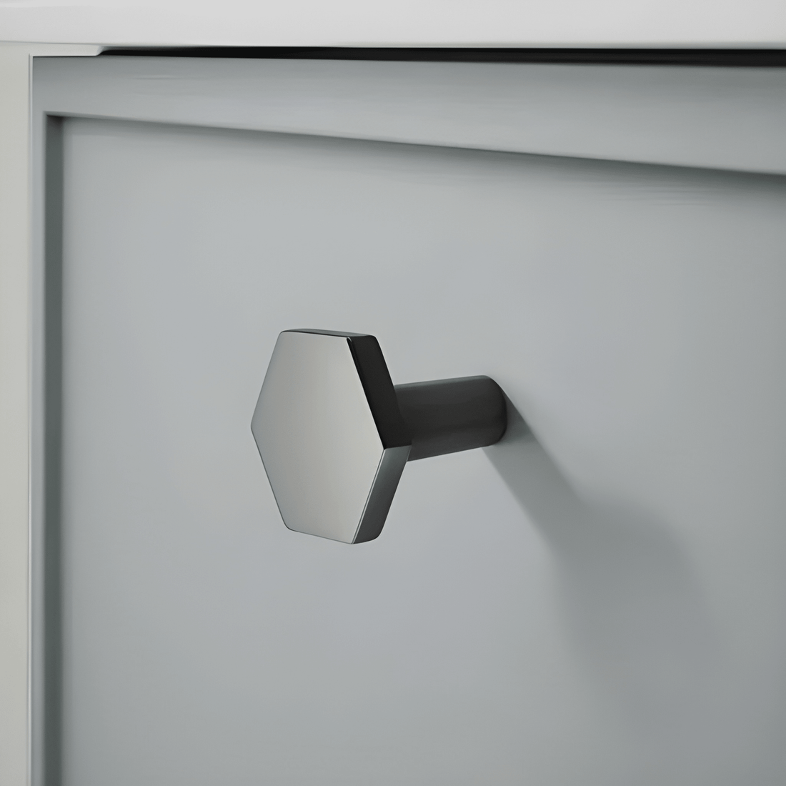 The Mantara B-0131 Zaraya Knob is a modern brass knob in gold, black, and bronze, perfect for drawers, cabinets, and wardrobes.