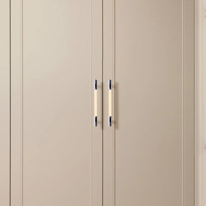 Beige wardrobe with two doors and sleek metallic handles, offering a soft, contemporary look by Mantara.