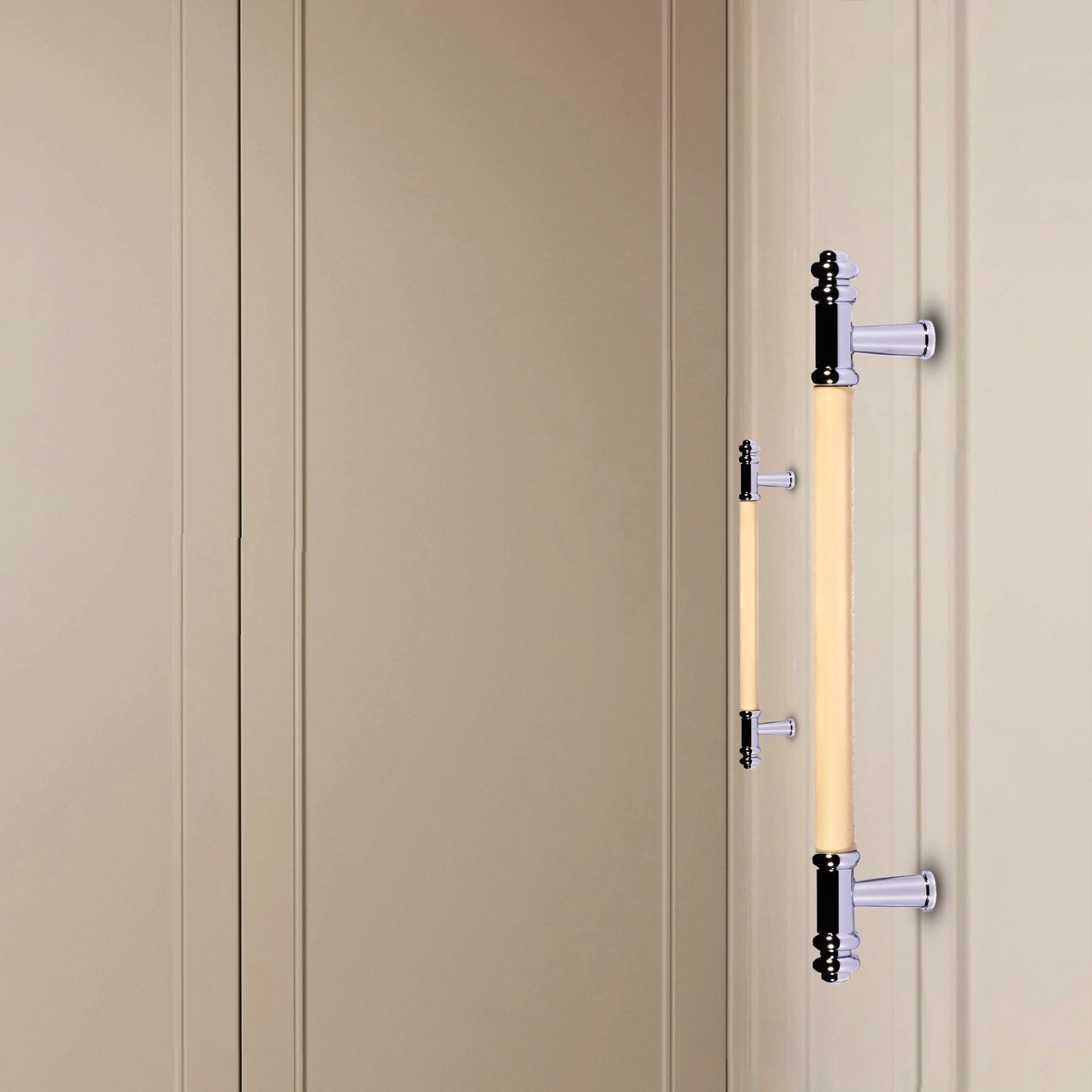 Beige cabinet with decorative handles set against a matching beige background, creating a subtle, elegant look by Mantara.